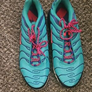 Nike Blue and Pink Athletic Shoes with Wavy Design